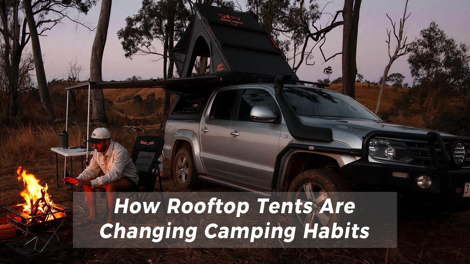 San Hima rooftop tent setup on a 4x4 vehicle in a scenic outdoor camping location